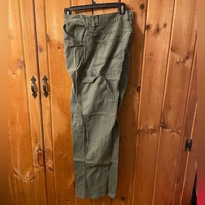 Green carpenter pants presented by Schmidt work wear